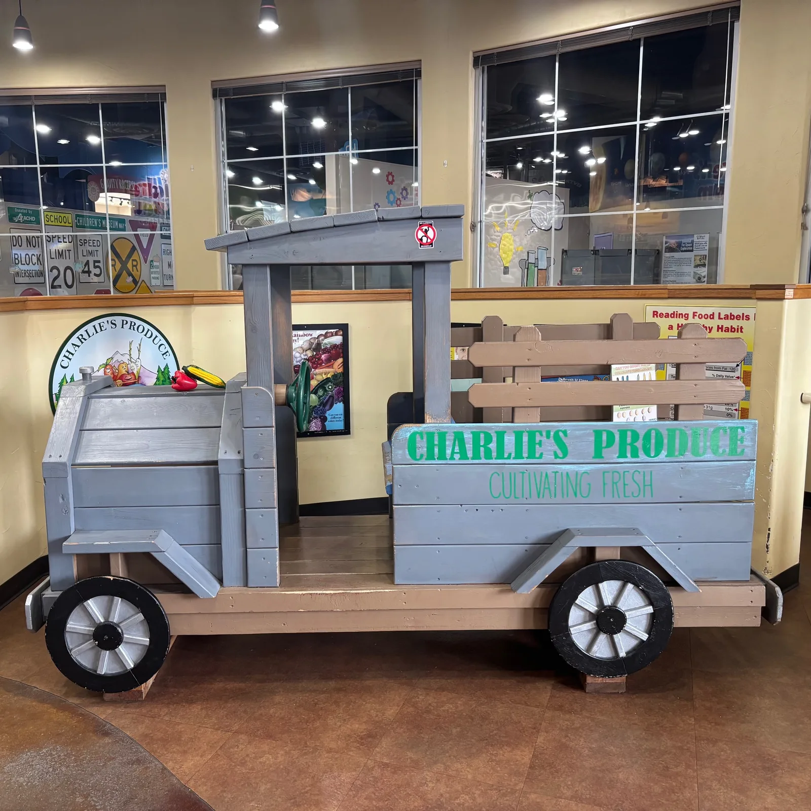 Truck with vegetables labeled Charlie's Produce Truck