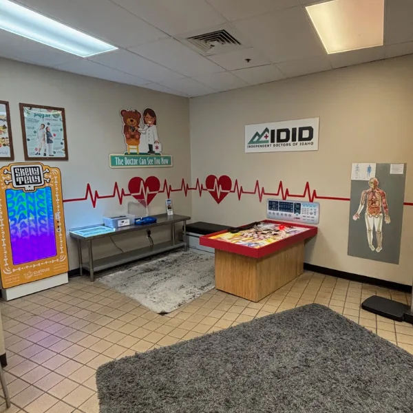Doctor's office exhibit with giant operation table, Skelly Telly, x-rays, and other educational medical toys.