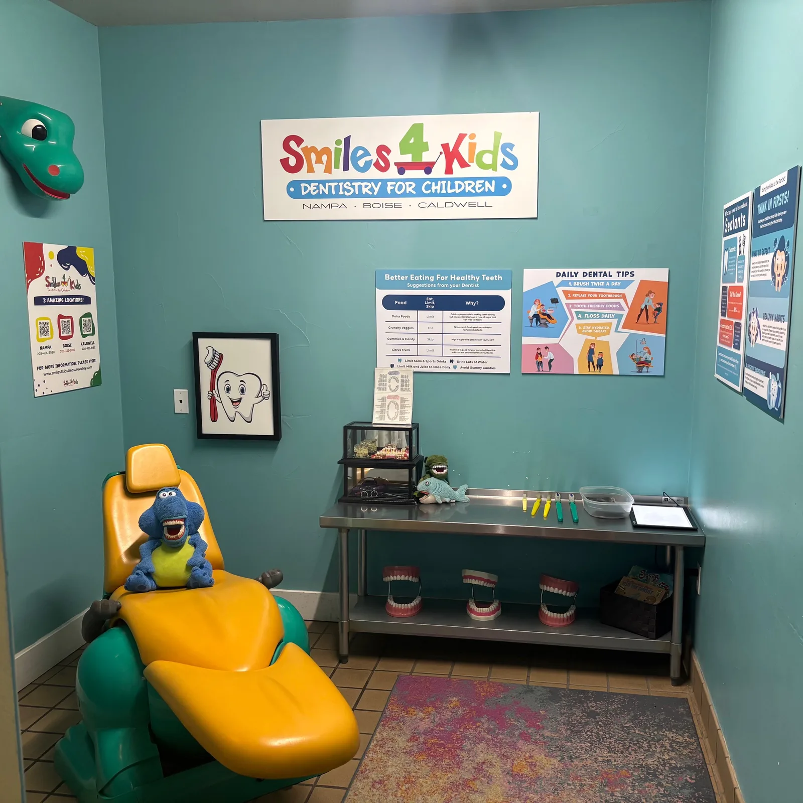Pretend dentist's office with a dentist chair, teeth and toothbrushes